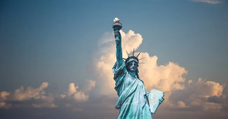 New York Blogs | Articles | News | Tips &Amp; Tricks | Video | Faq | Information | Infograph. 28 June 11, 2026 Iconic Statue Of Liberty With Majestic Clouds In New York, Usa. Perfect Travel Destination Image.