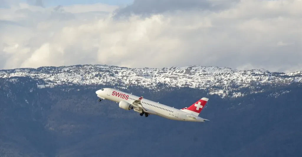 Bus From Washington Dc To New York Jfk Airport: The Complete Handbook 7 April 15, 2026 A Swiss Airplane Taking Off With Snow-Capped Mountains In The Background In Geneva, Switzerland.