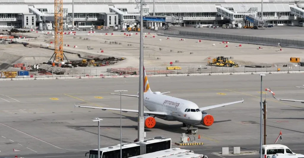 Airbus At Munich Airport Alongside Ongoing Construction Work, Showcasing Modern Aviation Infrastructure.