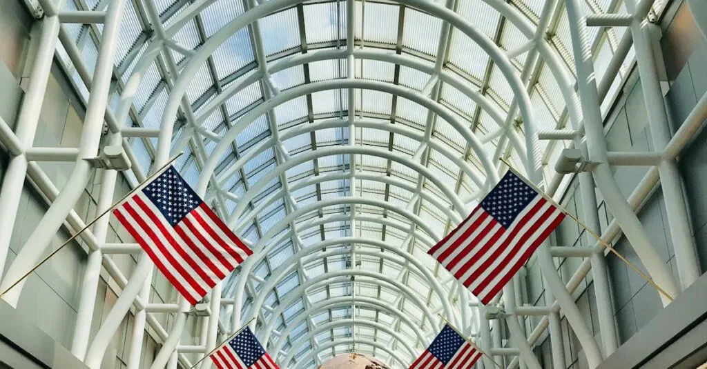 Interior Of Chicago O'Hare Airport With American Flags And Globe Sculpture.