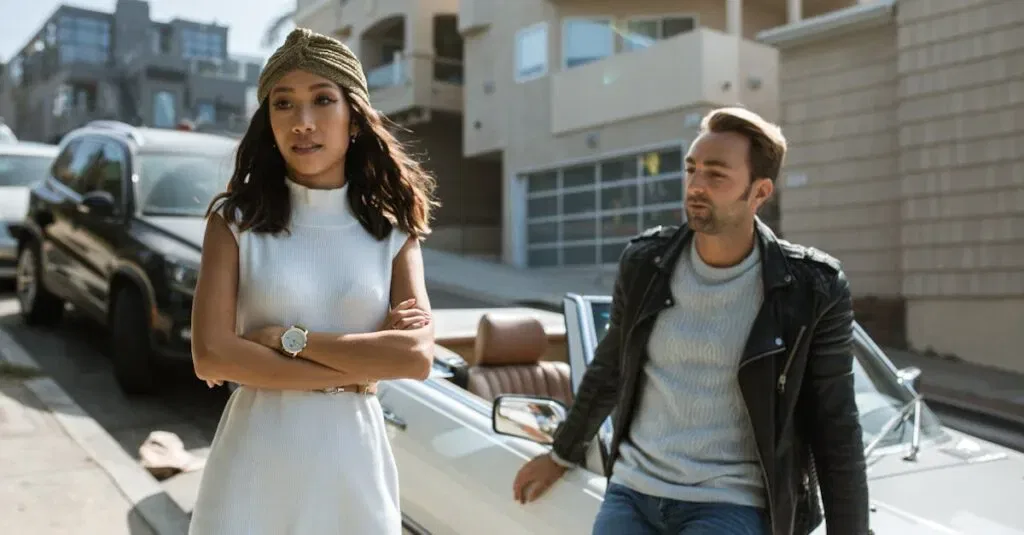 A Fashionable Couple Having An Intense Conversation Beside A Convertible On A Sunny Day.