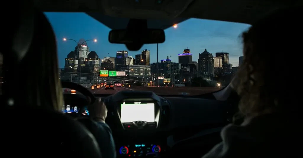 First Class And Luxury Travel With Jetblack : The Best Limo Service In New York City 3 April 15, 2026 View Of City Skyline During Night Drive, Captured Through Car Windshield.