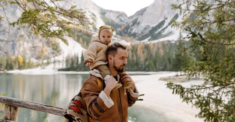 New York Blogs | Articles | News | Tips &Amp; Tricks | Video | Faq | Information | Infograph. 36 June 11, 2026 Father Carrying His Child By A Serene Lake Amidst Majestic Mountains, Enjoying Nature.