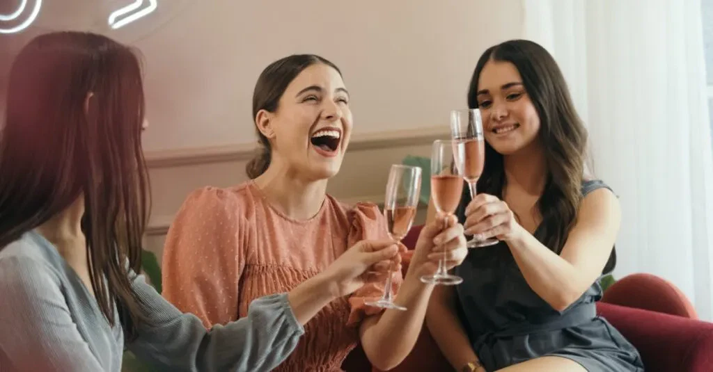 Your Ultimate Comfort, Reliability And Luxury With Jetblack - Black Cab Limousine Nyc 1 April 15, 2026 Three Women Laughing And Clinking Champagne Glasses In A Joyful Indoor Celebration.