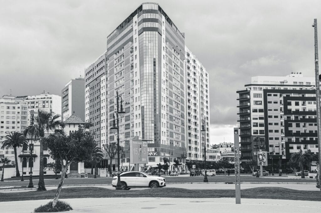 Black And White Photo Capturing The Modern Urban Architecture In Tangier, Morocco.