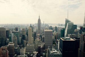 Breathtaking Aerial View Of New York City'S Iconic Skyline Featuring The Empire State Building.