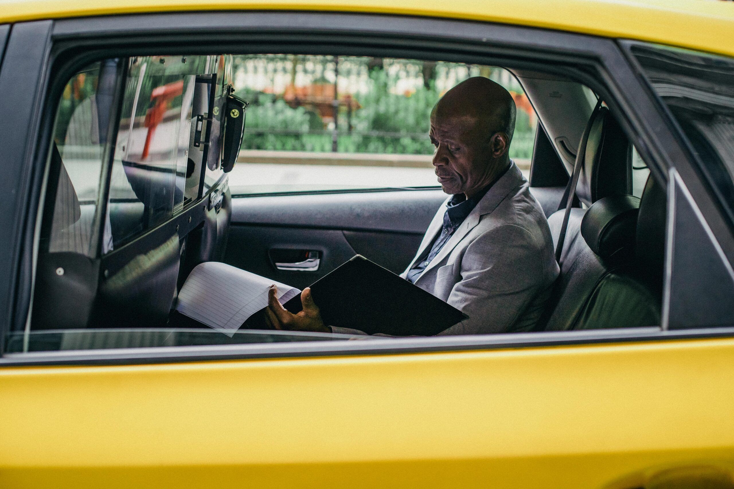 Blogs | Articles | News | Tips &Amp; Tricks | Video | Faq | Infomation 6 April 12, 2026 Side View Of African American Male In Business Suit Checking Folder With Documents While Sitting In Yellow Automobile