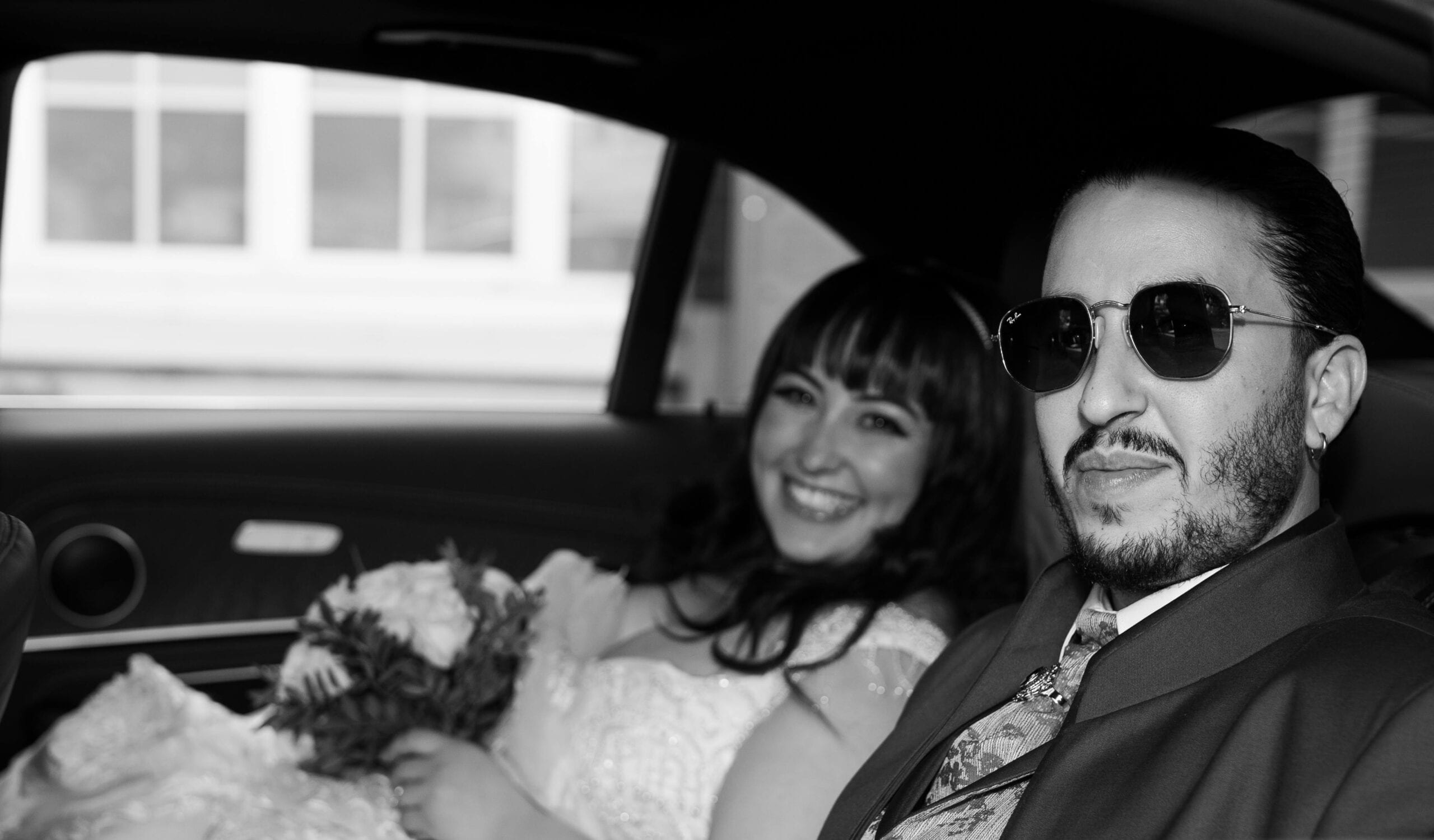 Blogs | Articles | News | Tips &Amp; Tricks | Video | Faq | Infomation 8 May 10, 2026 A Happy Newlywed Couple In A Car, Elegantly Dressed And Smiling.