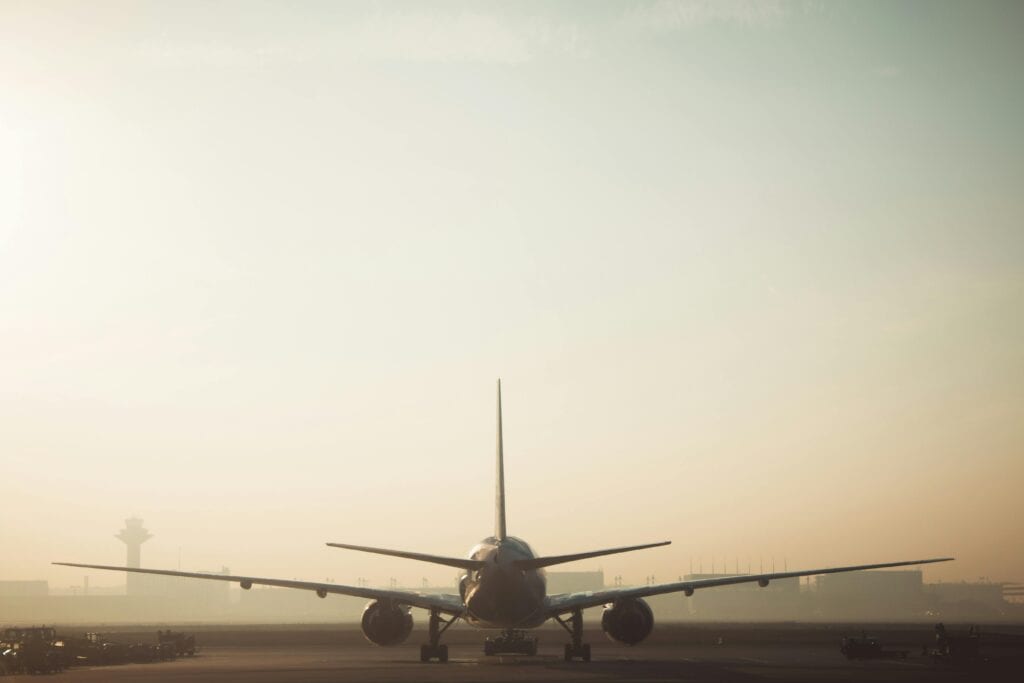 Number 1 Airport Luxury Ground Transportation Service Near By: 4 Seasonal Honest Facts For Nyc In 2026 8 May 24, 2026 A Misty Morning Scene Of A Plane On The Runway With A Hazy Sky Background, Showcasing Air Travel Ambiance.