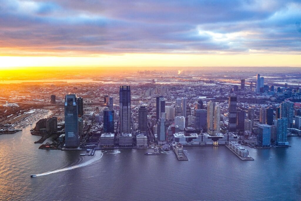 Limo Services In New Jersey Prices: Honest 2026 Corporate Comparison 3 May 14, 2026 Breathtaking Aerial View Of Jersey City'S Modern Skyline At Sunset With Vibrant Colors And Skyscrapers.
