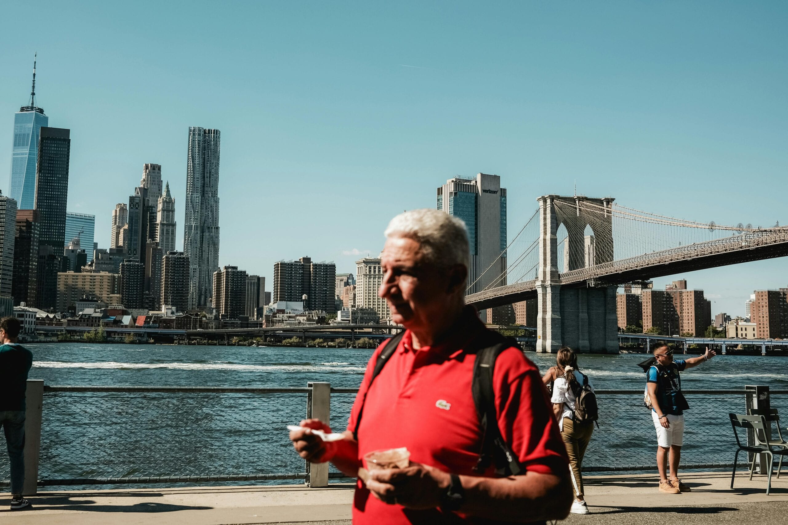 Blogs | Articles | News | Tips &Amp; Tricks | Video | Faq | Infomation 4 May 10, 2026 Tourists Enjoy The View Of The Brooklyn Bridge Against The New York City Skyline On A Sunny Day.
