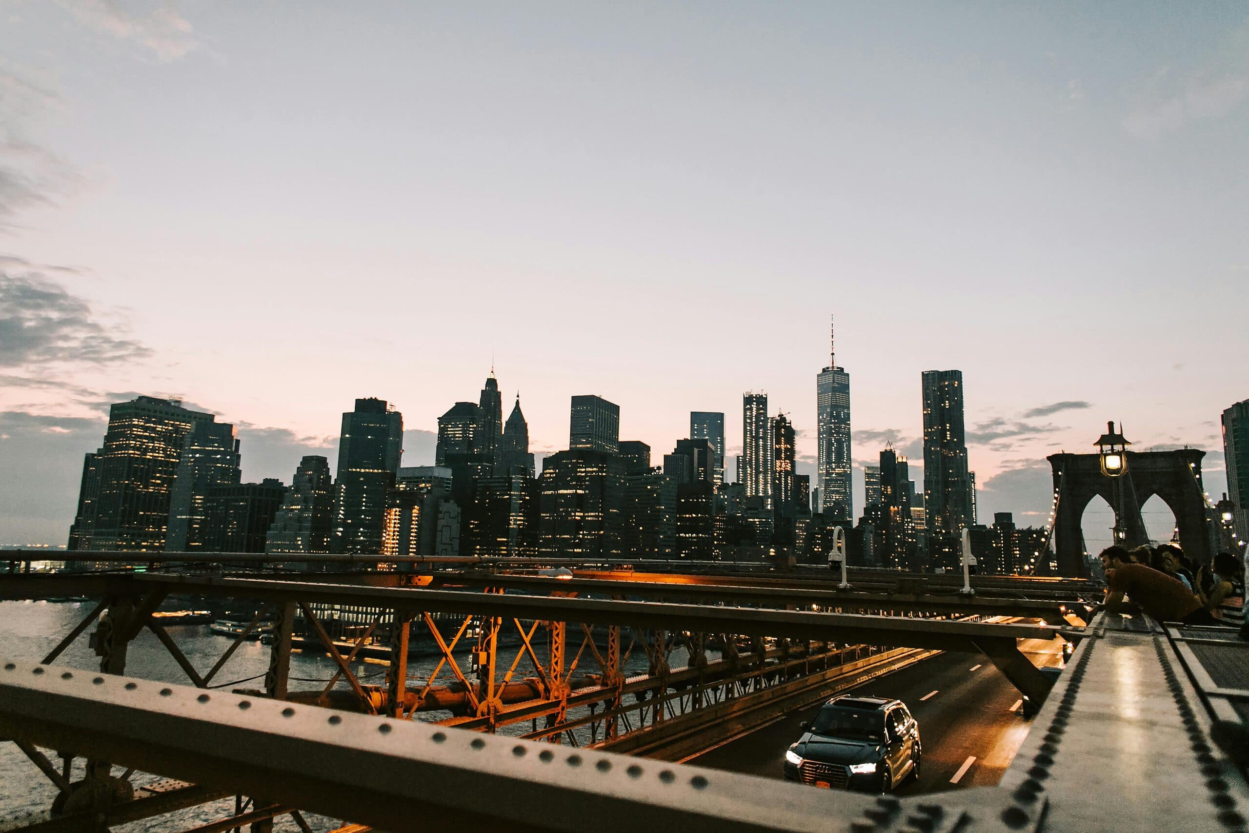 Breathtaking View Of New York City&Amp;Apos;S Illuminated Skyline From The Brooklyn Bridge At Dusk.