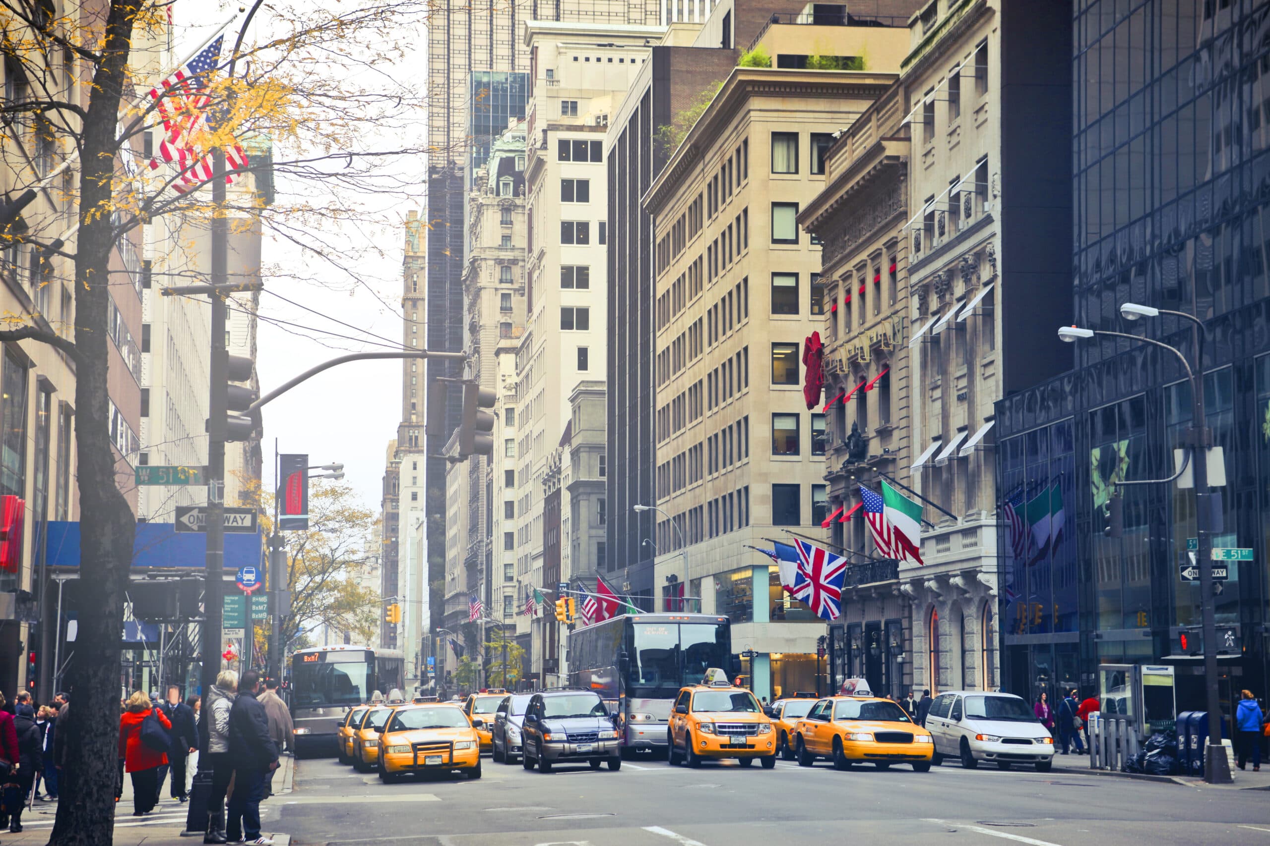 Blogs | Articles | News | Tips &Amp; Tricks | Video | Faq | Infomation 3 May 25, 2026 Busy New York City Street With Iconic Taxis, Buildings, And International Flags