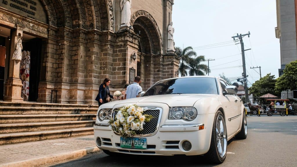 Luxury Wedding Limousine New York City Black Car Sedan At Manhattan Venue Entrance