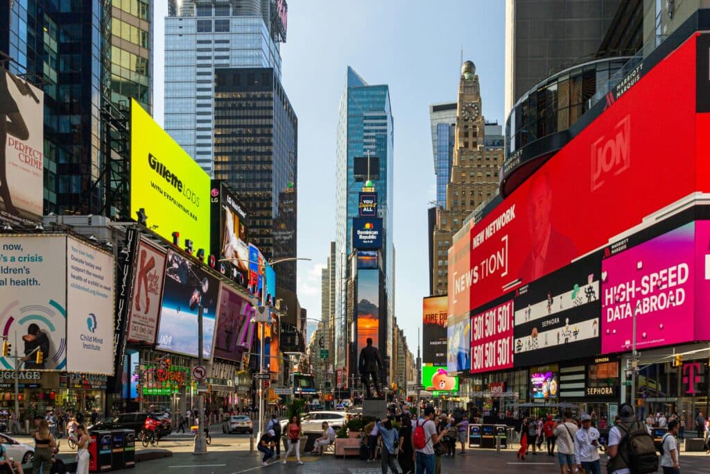 Airport Near Broadway New York: 5 Honest Things Families Need To Know In 2026 1 June 10, 2026 Bustling Times Square Nyc With Vibrant Billboards And Lively Crowd Under A Bright Sky.