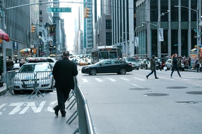 Urban Street View Of Traffic And Pedestrians In New York City'S Bustling W 48 St Area.