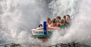 Exciting Group Splash On A Thrilling Water Ride At Europa Park, Capturing Joy And Adventure.
