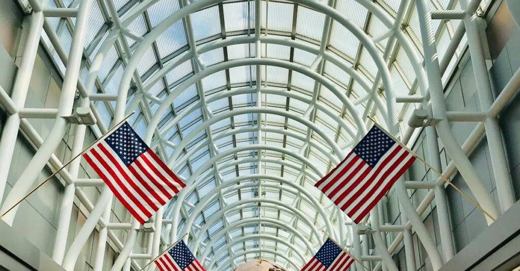 Interior Of Chicago O'Hare Airport With American Flags And Globe Sculpture.