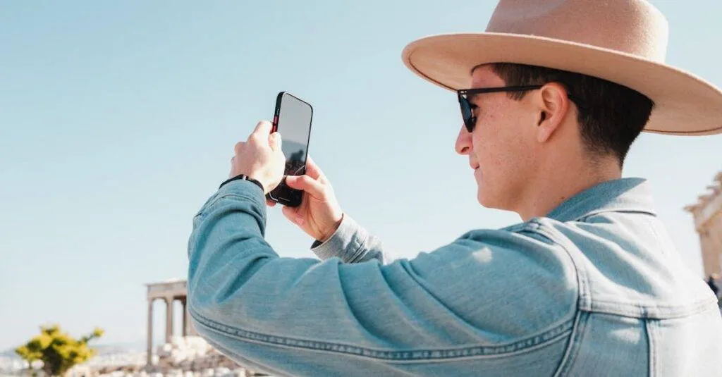 Man In Denim Jacket Taking Photo In Front Of Ancient Columns, Capturing His Travel Memories.