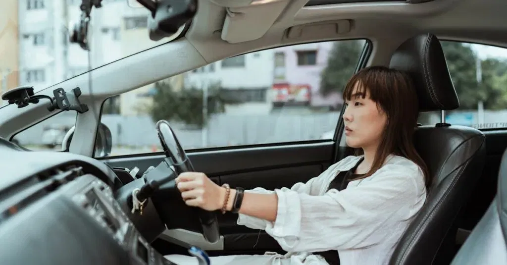 Car Driver Service Near Me: Combining Comfort And Reliability With Jetblack 7 April 4, 2026 Confident Young Woman Driving In The City, Focused And Pensive.