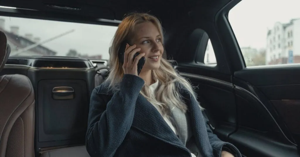 Cab From LaGuardia to Manhattan: The Guide For A Smooth Ride 4 Businesswoman talking on phone while sitting in a luxury car, portraying professionalism and leadership.