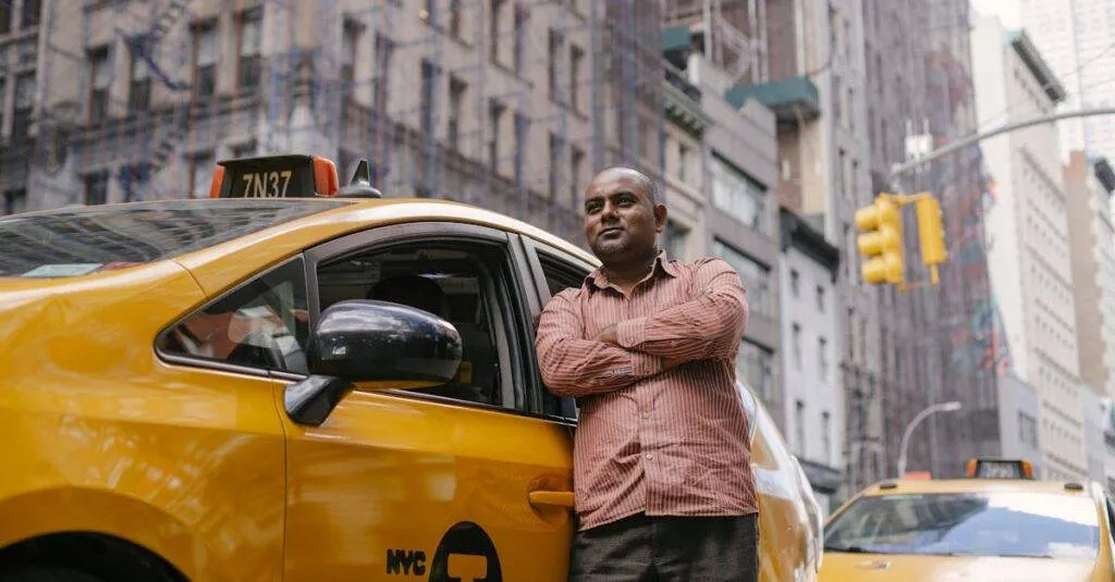 Yellow Taxi Waiting Curbside For How To Transfer From Jfk To Lga Airport, Showing Airport Terminals And Traffic On The Van Wyck Expressway In Jamaica, Queens, During A Rainy Day In 2025.