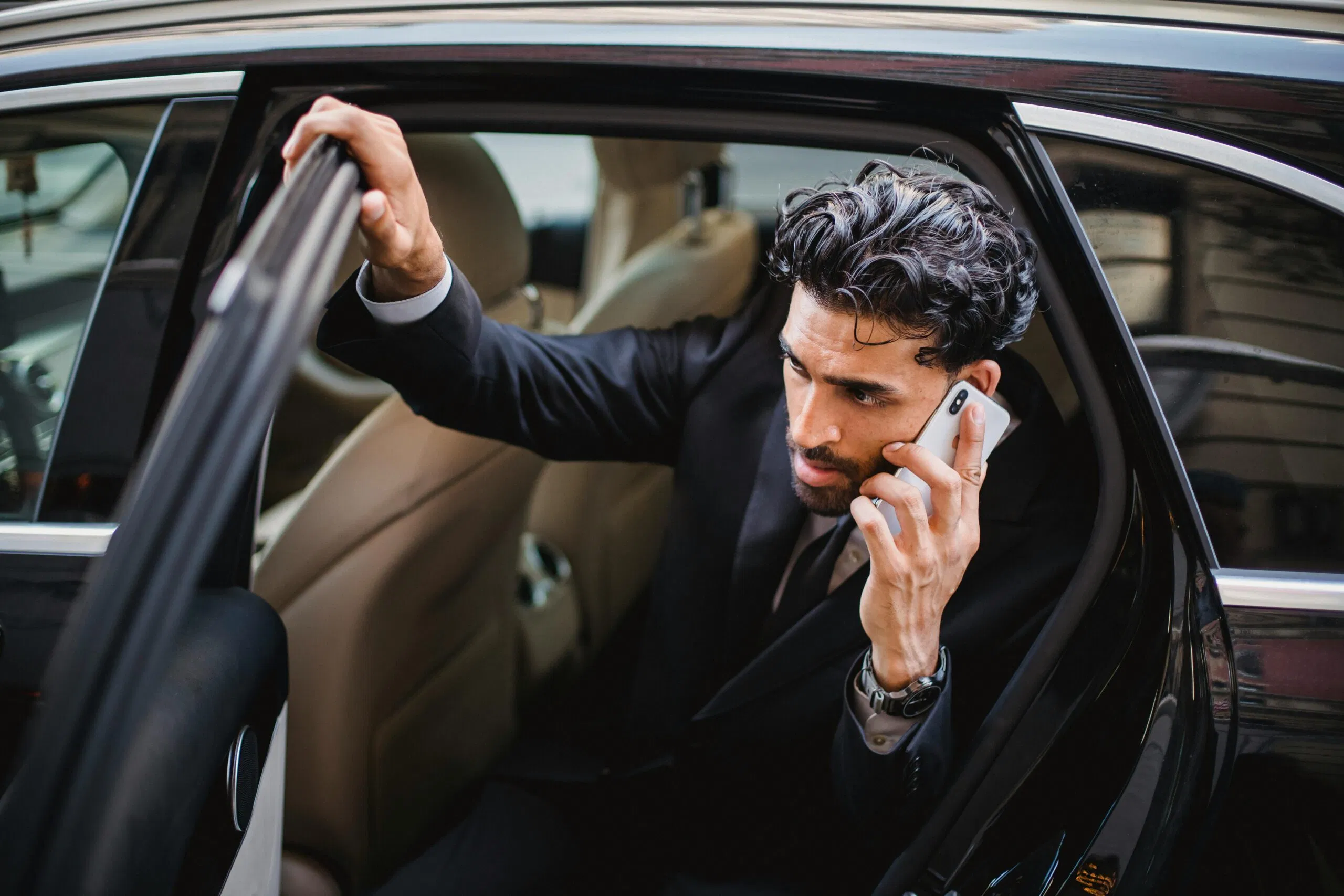 Blogs | Articles | News | Tips &Amp; Tricks | Video | Faq | Infomation 5 April 1, 2026 Professional Man In A Suit Exits A Luxury Vehicle During A Phone Call, Emphasizing A Busy Lifestyle.
