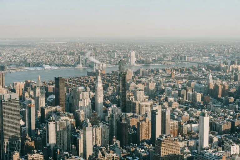 Spectacular Drone View Of New York City Skyline With Modern Skyscrapers And Towers Near Hudson River On Sunny Day
