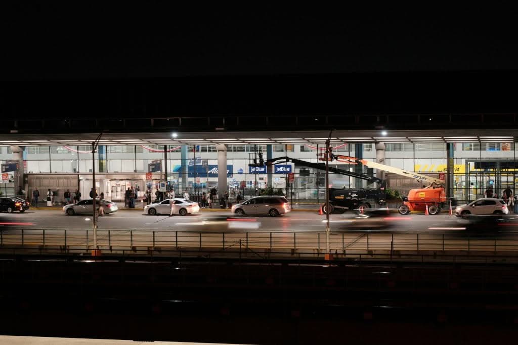 luxury transportation from laguardia to manhattan JetBlack black car Cadillac SUV at LGA terminal