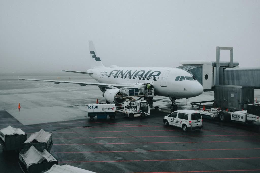 How to choose a cab service in NYC — JFK arrivals pickup zone how to choose a cab service in NYC JetBlack black car at JFK arrivals with family luggage