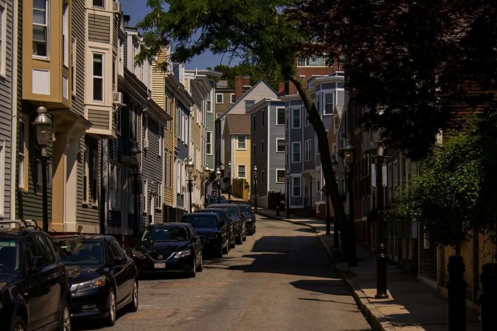 Corporate stretch limo at JFK airport arrivals — executive pickup how much is a stretch limo in nyc corporate booking black car JFK airport pickup