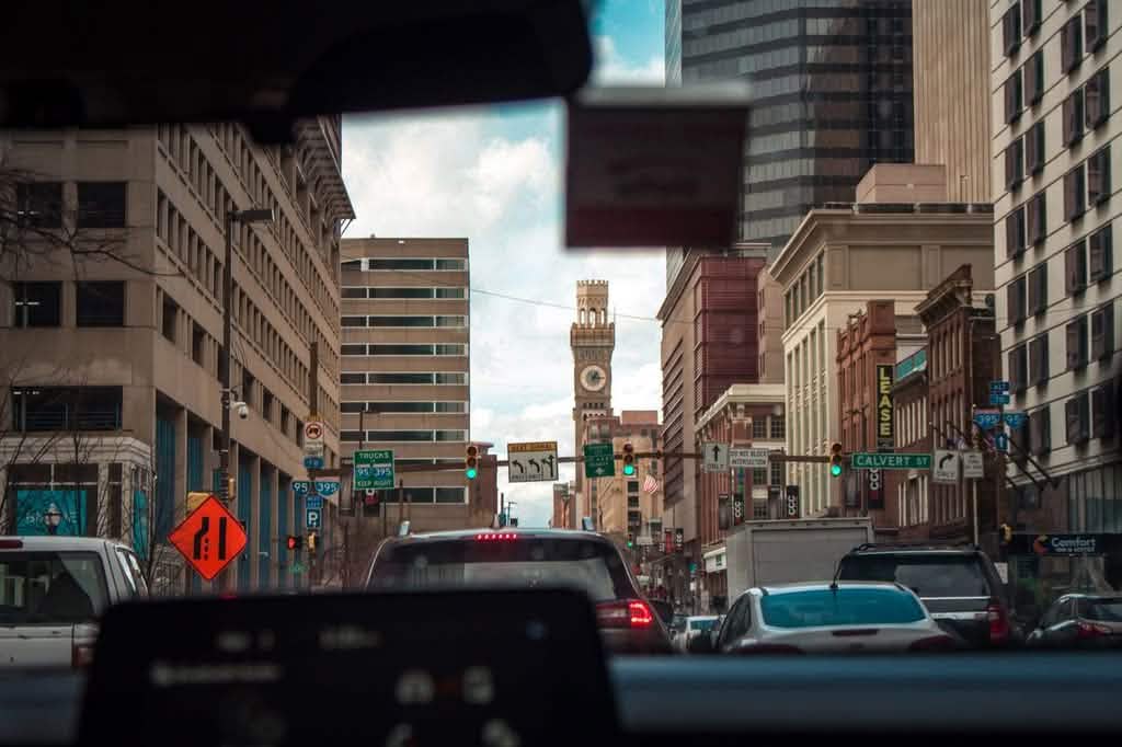 NJ to NYC car service pickup affordable limo service NJ to NYC black sedan at Newark Airport pickup