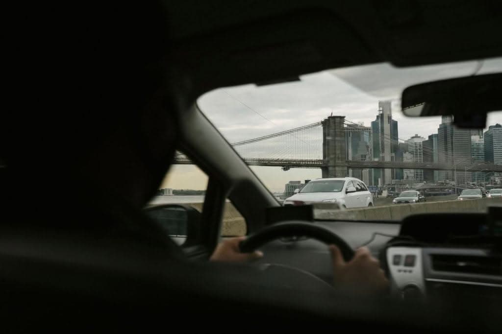 Laguardia Thrifty Car Rental Alternative — Jetblack Black Sedan At Airport Pickup Zone
