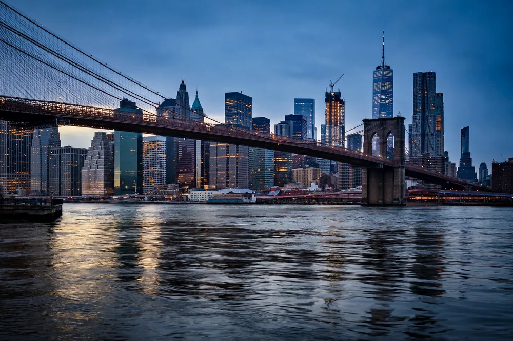 Best Way From JFK to Brooklyn: The Honest 2026 Decision Guide 3 October 17, 2026 Brooklyn Bridge and Downtown Brooklyn skyline at dusk, destination for JFK arrivals